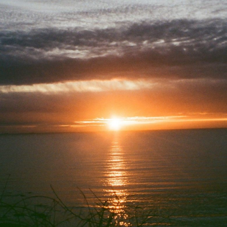 Orange sunset over the sea in Cornwall